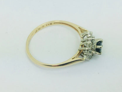 14k Yellow and White Gold Oval Cut 0.35ct Sapphire September Birthstone & 0.30ct Diamond Cluster Ring
