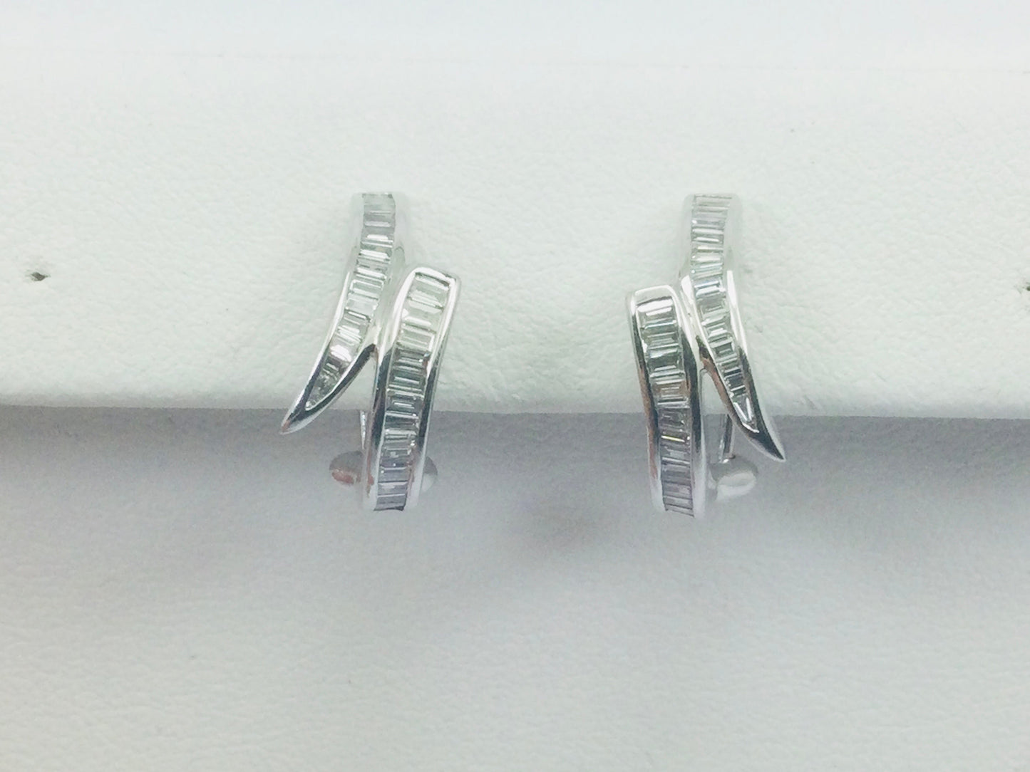 18k White Gold Baguette Cut 0.85ct Diamond Row Set Omega Style Clip Earrings