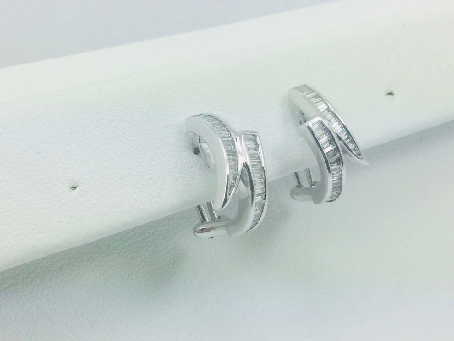 18k White Gold Baguette Cut 0.85ct Diamond Row Set Omega Style Clip Earrings