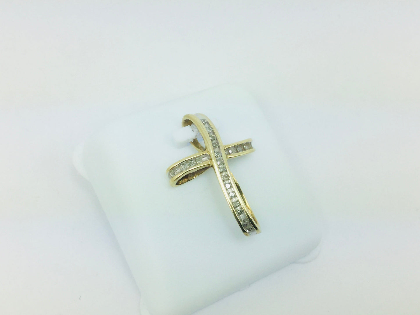 10k Yellow Gold Round Cut 11pt Diamond Cross Pendent