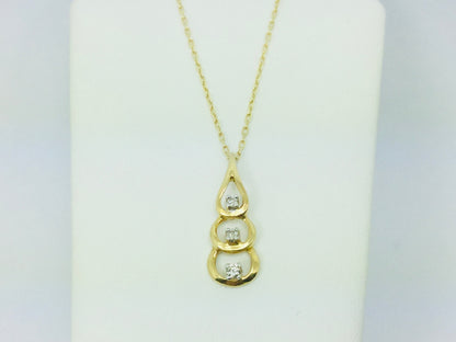 14k Yellow Gold Round Cut 9pt Diamond Trilogy Teardrop Pendent
