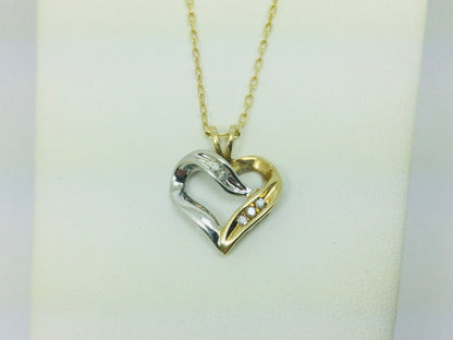 10k White and Yellow Gold Round Cut 5pt Diamond Heart Pendent