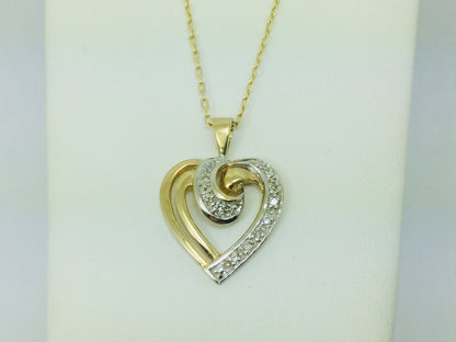 10k Yellow Gold Round Cut 10pt Diamond Heart Pendent