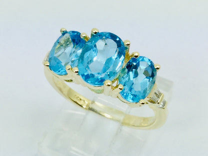 14k Yellow Gold Oval Cut Blue Topaz December Birthstone & Diamond Ring
